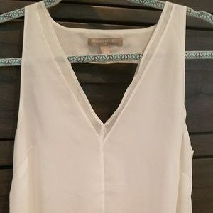 White sleeveless top